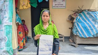 মুজিব শতবর্ষের ঘর দলিল হাতে ঘরের সামনে শিউলি, দখলদাররা রয়েছে ঘরের ভিতরে
